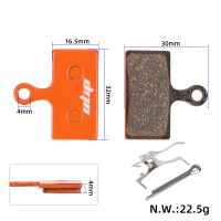 Metalinės dervos stabdžių trinkelės Shimano M615 (oranžinės)